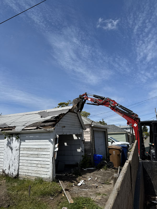Garage demolition being done by Franky's Excavation in Seattle