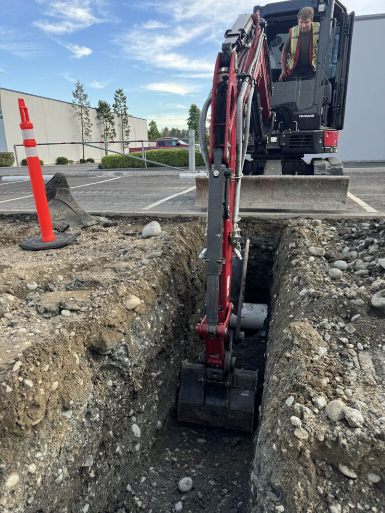 commercial utility and sewage trenching project in south king county with franky's excavation