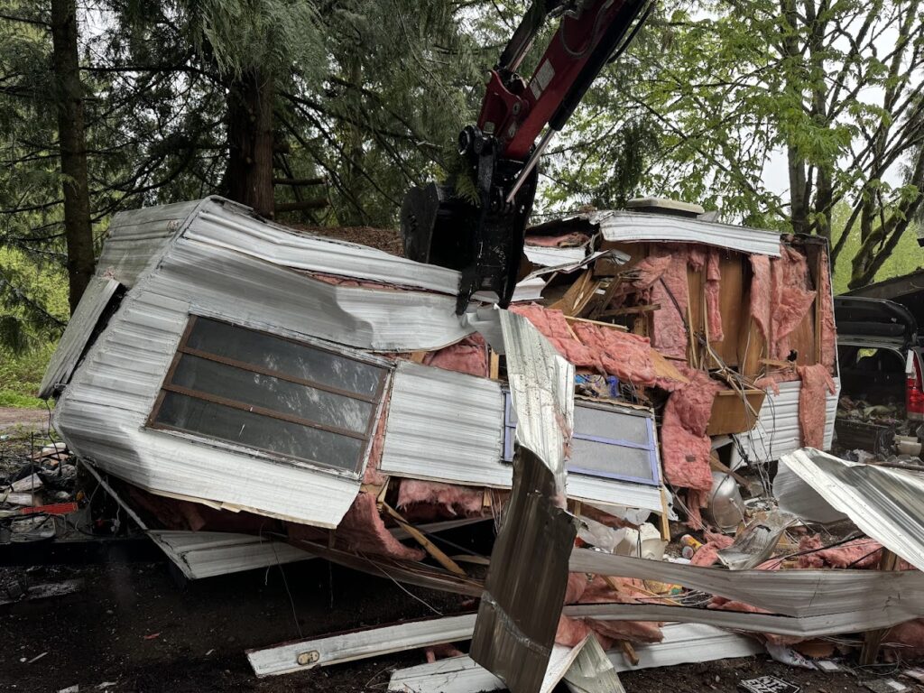 emergency demo of a mobile home done by franky's excavation