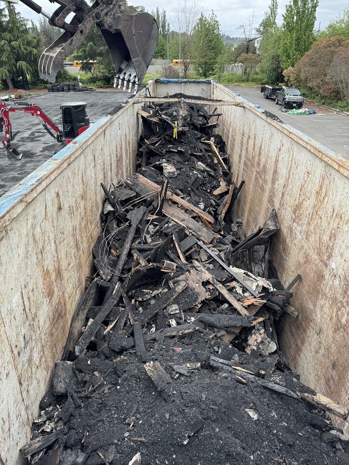 hauling off the debris from the emergency demolition project done by franky's excavation