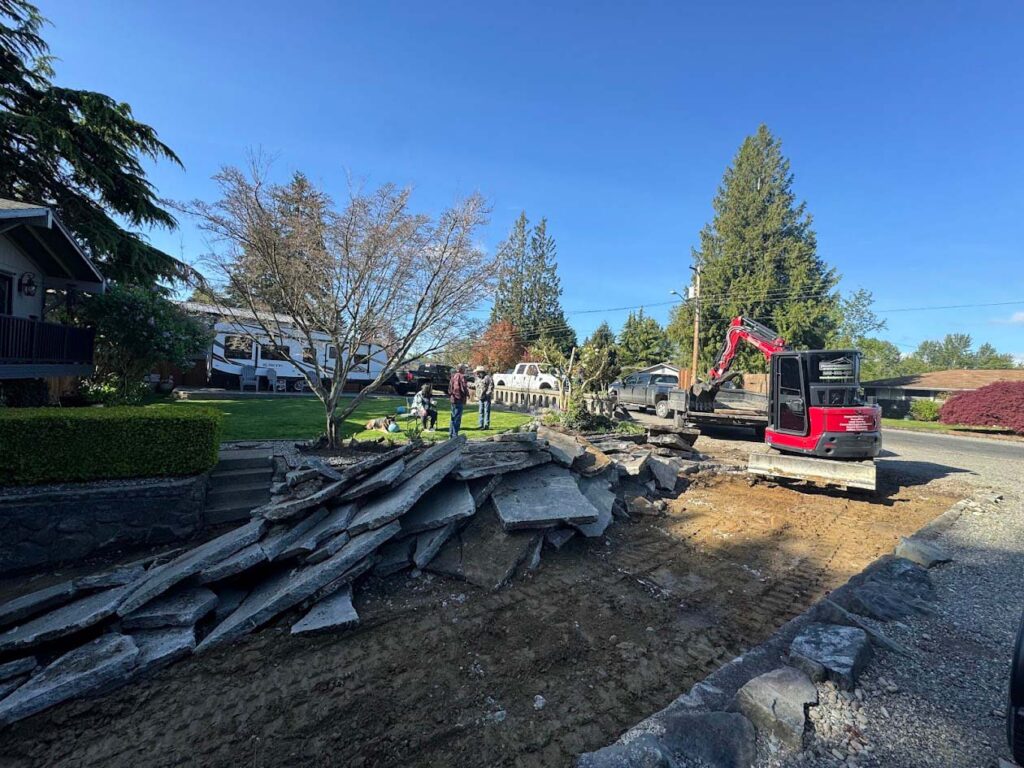 concrete driveway being removed by franky's excavation