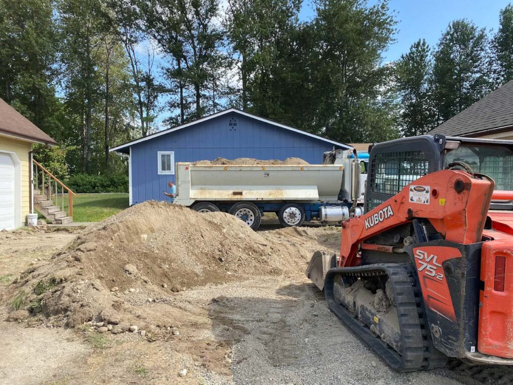 large amount of dirt being professionally removed from franky's excavation in washington