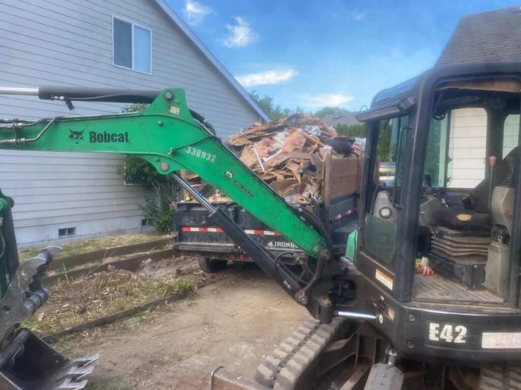 final cleanup up a fence being removed by franky's excavation