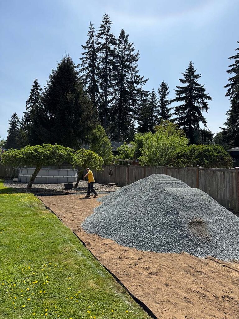 french drain installation preparation for gravel driveway by franky's excavation