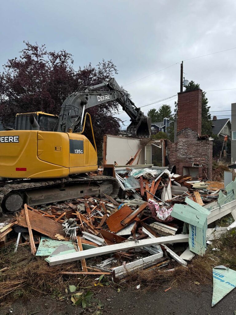 home demolition being done by franky's excavation in washington