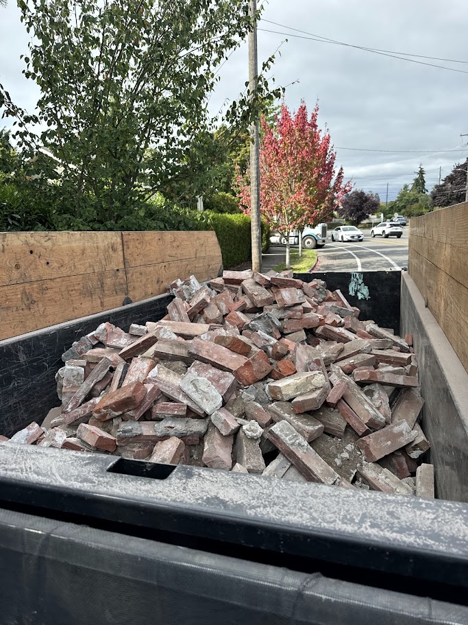 retaining wall fully removed and being disposed of by franky's excavation